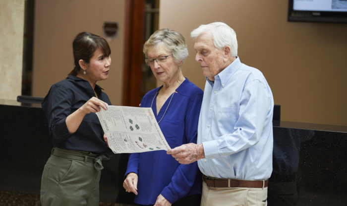 staff-talking-to-couple