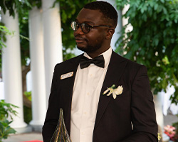 Agboolla Omoshebi with award - Montage Heights