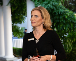 A woman accepts an award.