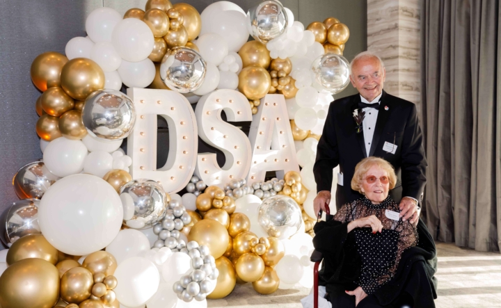 Generations staff stand in front of the DSA Balloons